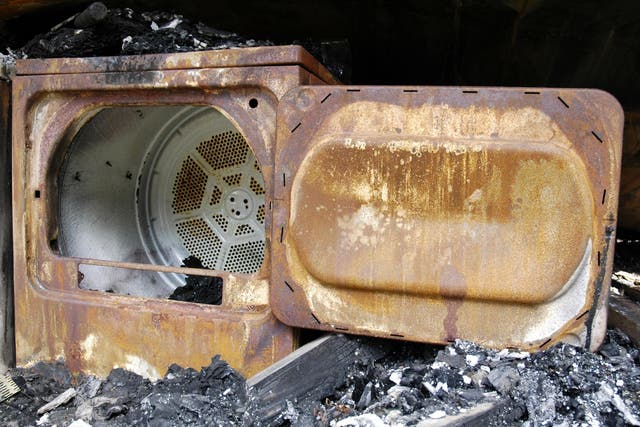 A burned-out tumble dryer