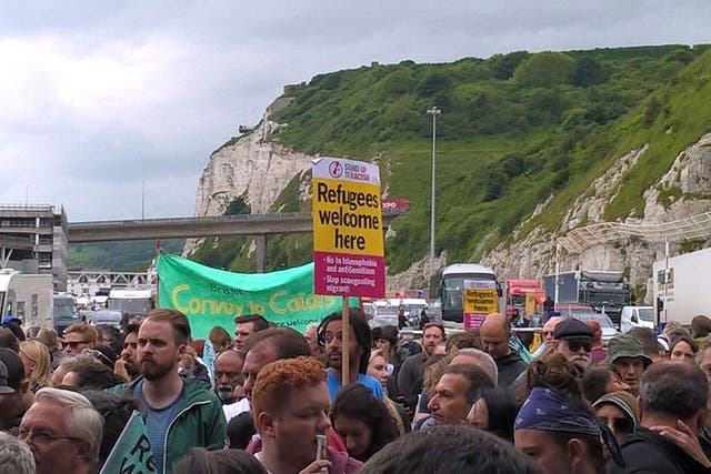 Volunteers holding an impromptu rally in Dover, Kent, after an aid convoy was refused entry to France by authorities.