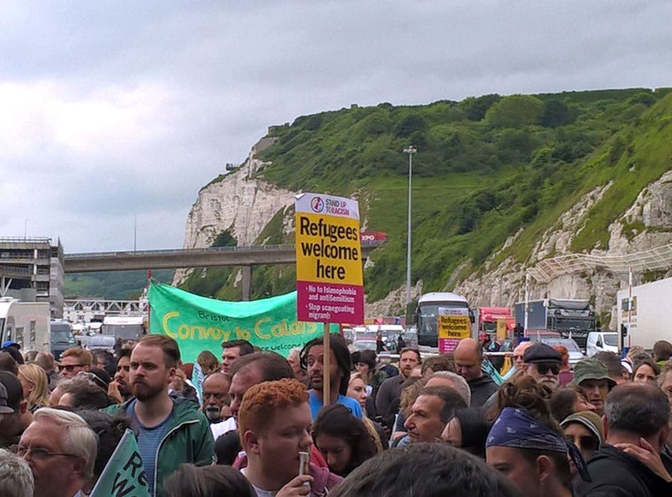 Volunteers holding an impromptu rally in Dover, Kent, after an aid convoy was refused entry to France by authorities.