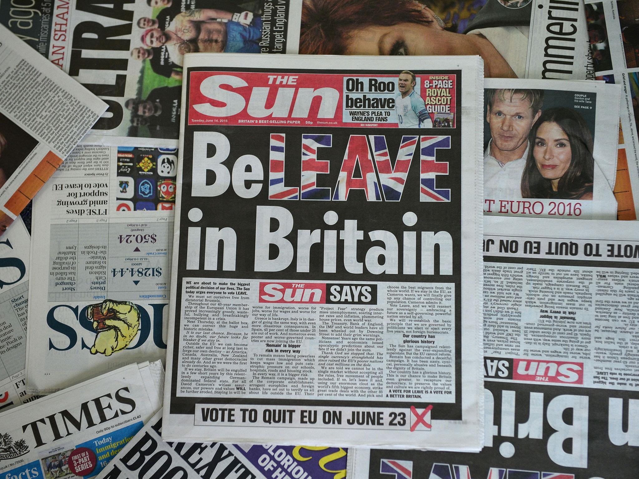 An arrangement of newspapers pictured in London on 14 June, 2016 shows the front page of the Sun daily newspaper with a headline urging readers to vote 'Leave' in the 23 June EU referendum