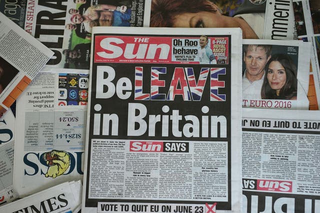 An arrangement of newspapers pictured in London on 14 June, 2016 shows the front page of the Sun daily newspaper with a headline urging readers to vote 'Leave' in the 23 June EU referendum