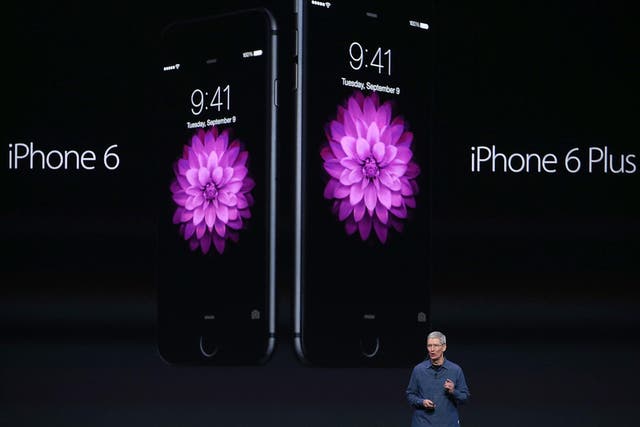 Apple CEO Tim Cook announces the iPhone 6 during an Apple special event at the Flint Center for the Performing Arts on 9 September, 2014 in Cupertino, California