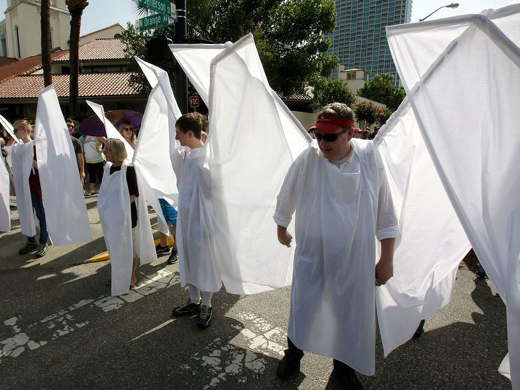The 'angels' wore large wings to block out protestors at the funerals of victims of the Orlando shootings