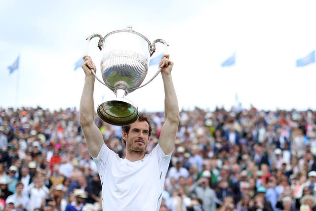 Andy Murray lifts the Queen's trophy for a fifth time in seven years