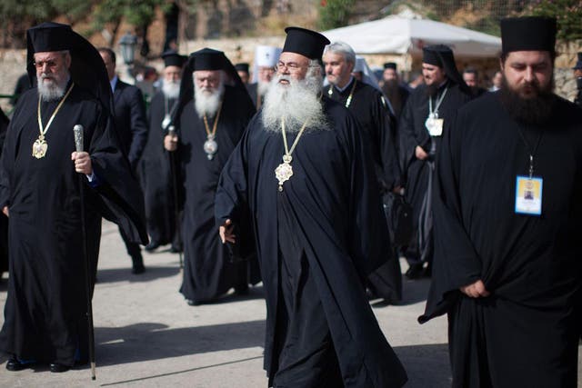 Delegates arrive at the Orthodox Academy of the Greek island of Crete to take part in an meeting between leaders of Orthodox churches.