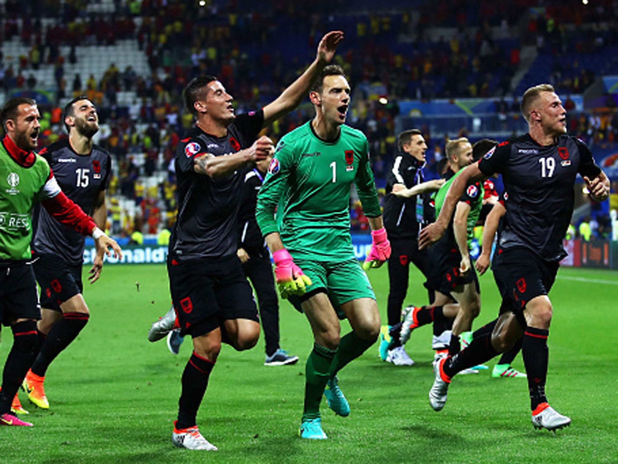 Albania's players celebrate their historic victory at the final whistle (Getty)