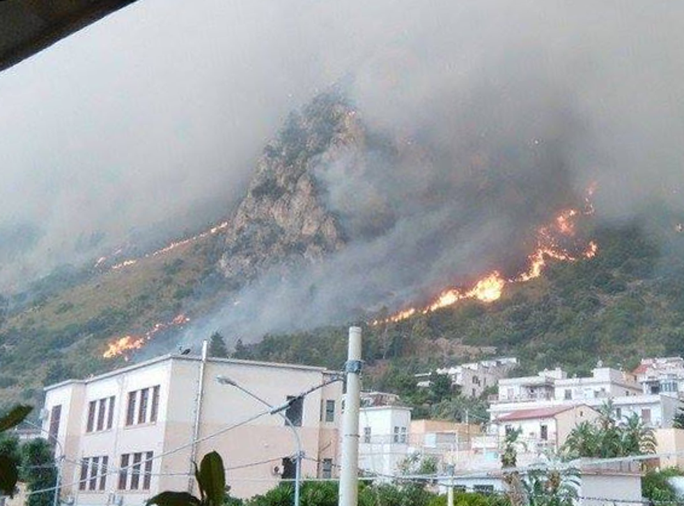 Wildfires burn in Sicily