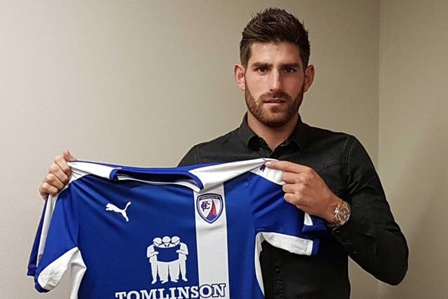Ched Evans is revealed as a Chesterfield player
