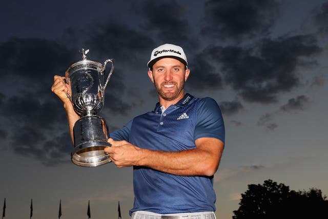 Dustin Johnson shows off his first major - the US Open - claimed on Sunday night at Oakmont