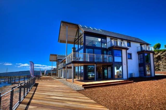 <p>Portavadie is a glossy, £10m development on the banks of Loch Fyne</p>
