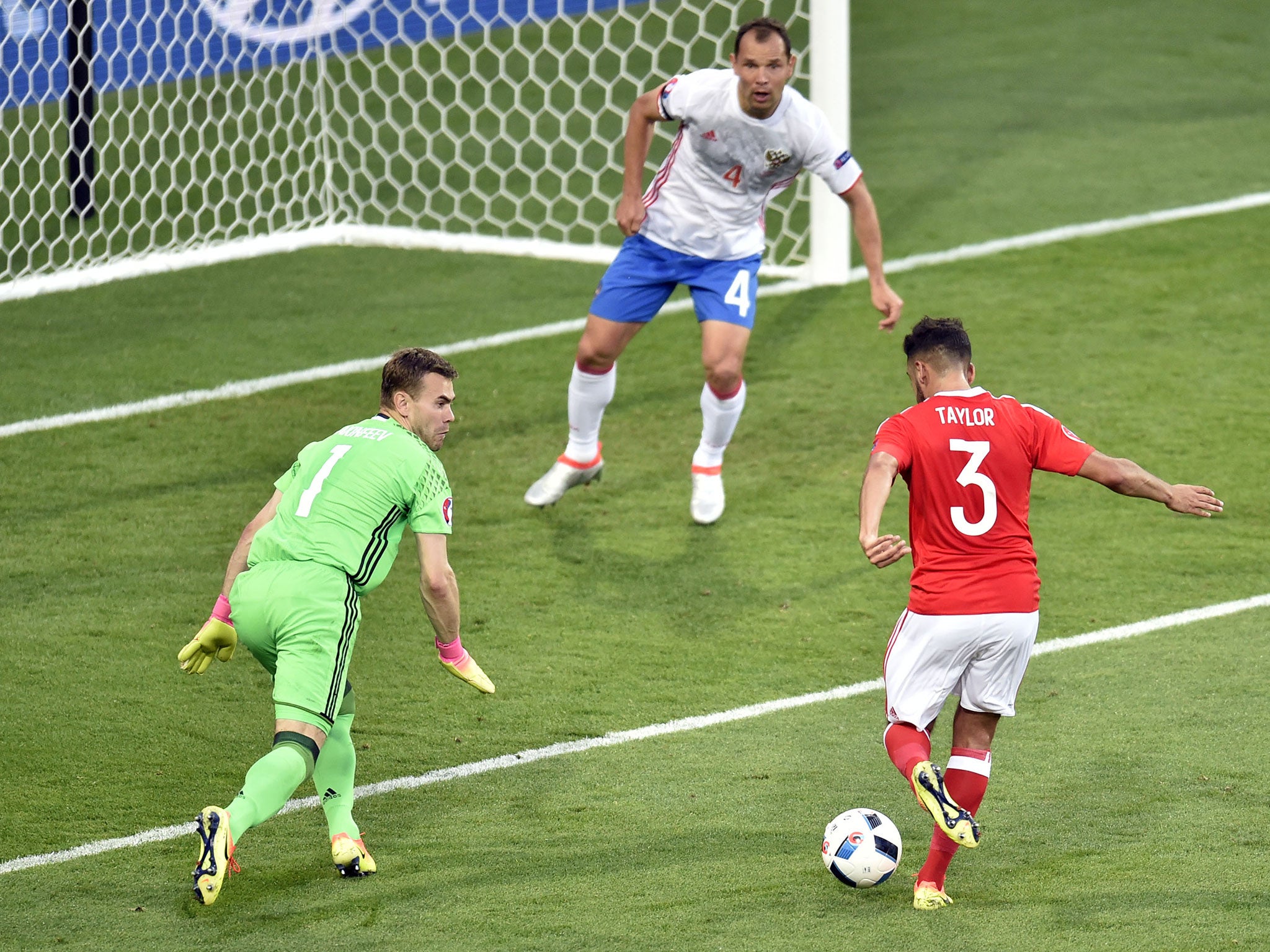 Neil Taylor slams home Wales' second goal against Russia