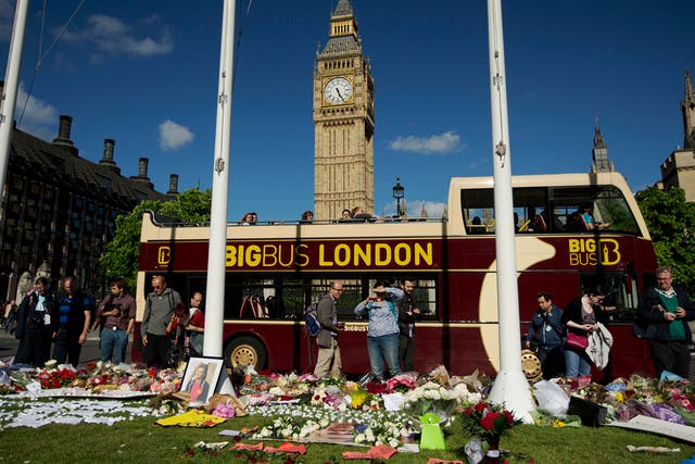 Well-wishers leaving tributes to murdered MP Jo Cox in Parliament Square