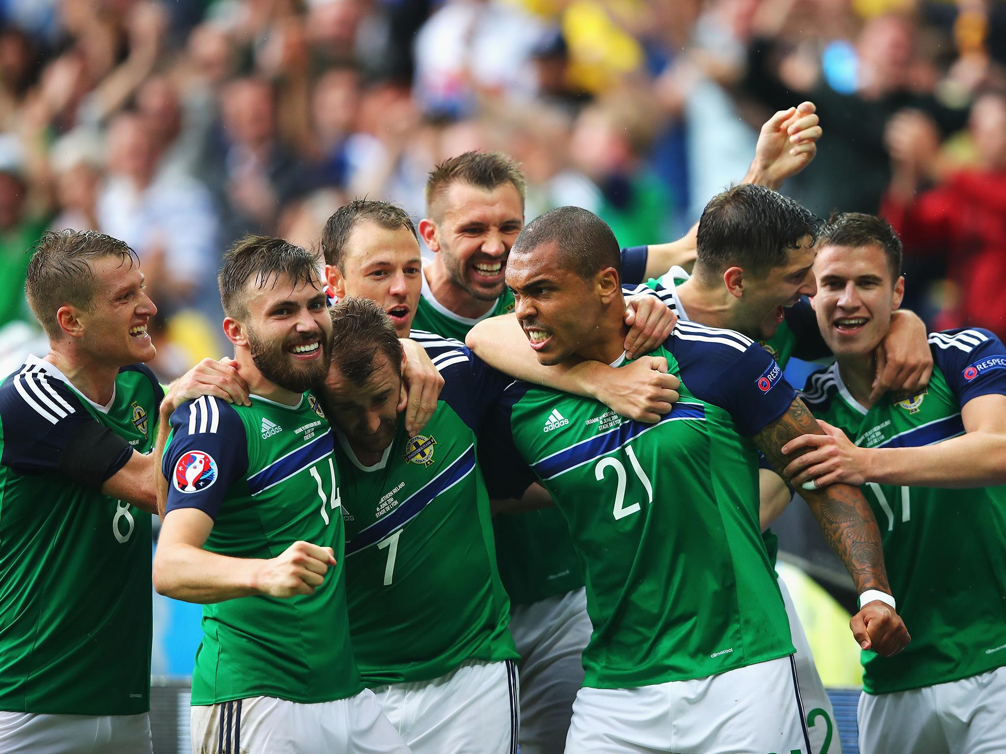 Northern Ireland's players celebrate their victory over Ukraine
