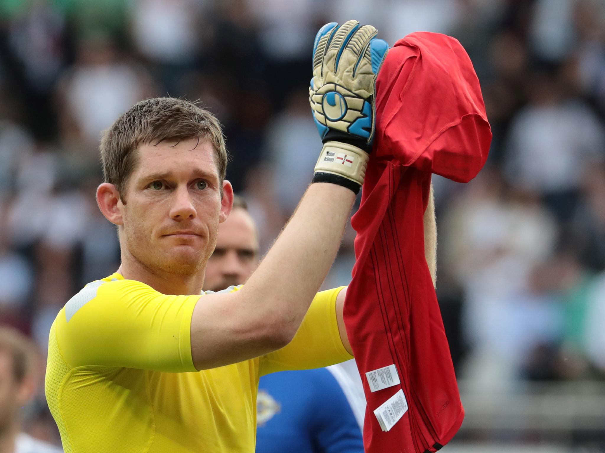 McGovern, Northern Ireland's man of the match, applauds his supporters