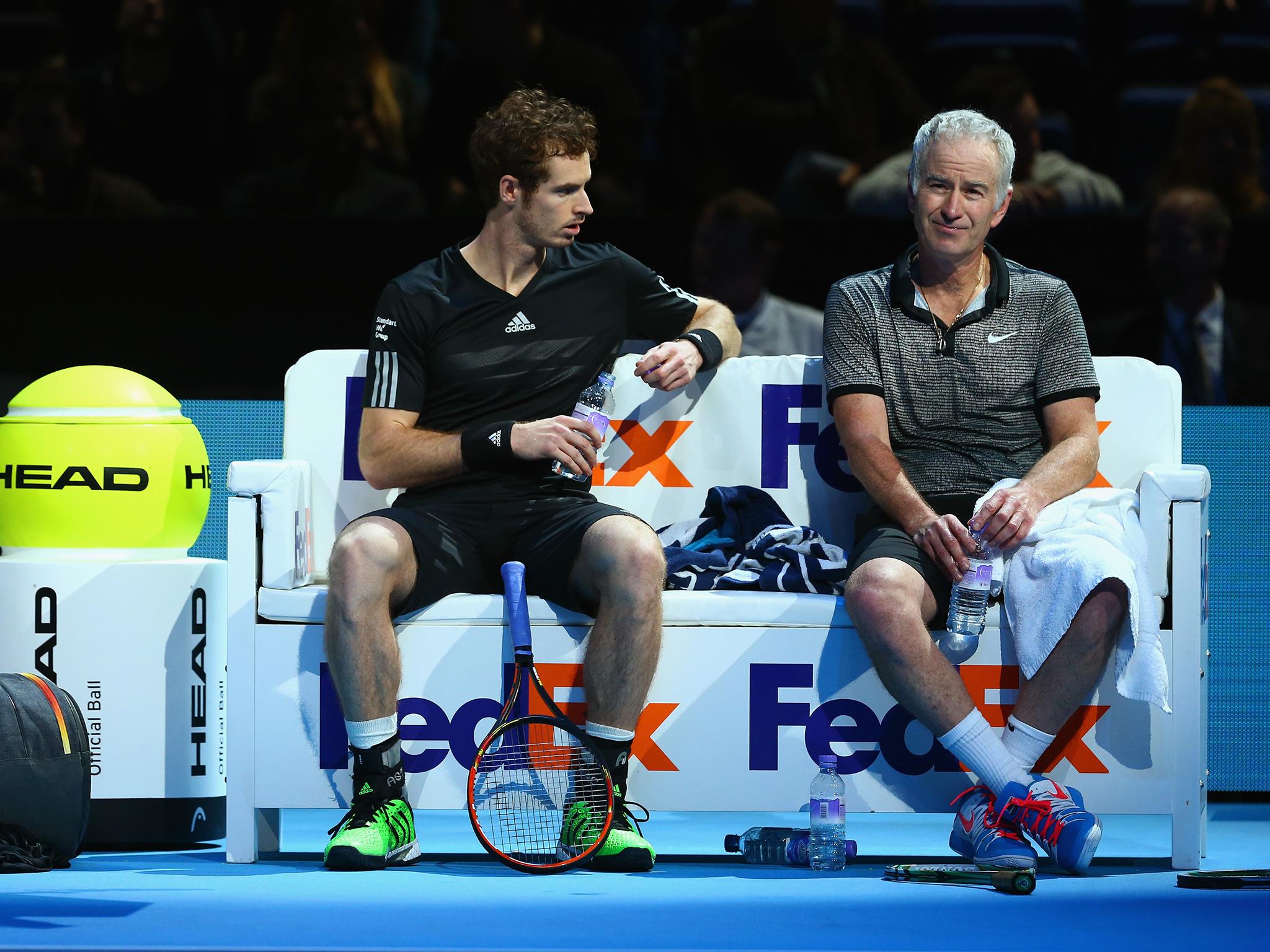 Murray and McEnroe during an exhibition match at the Barclays ATP World Tour Finals