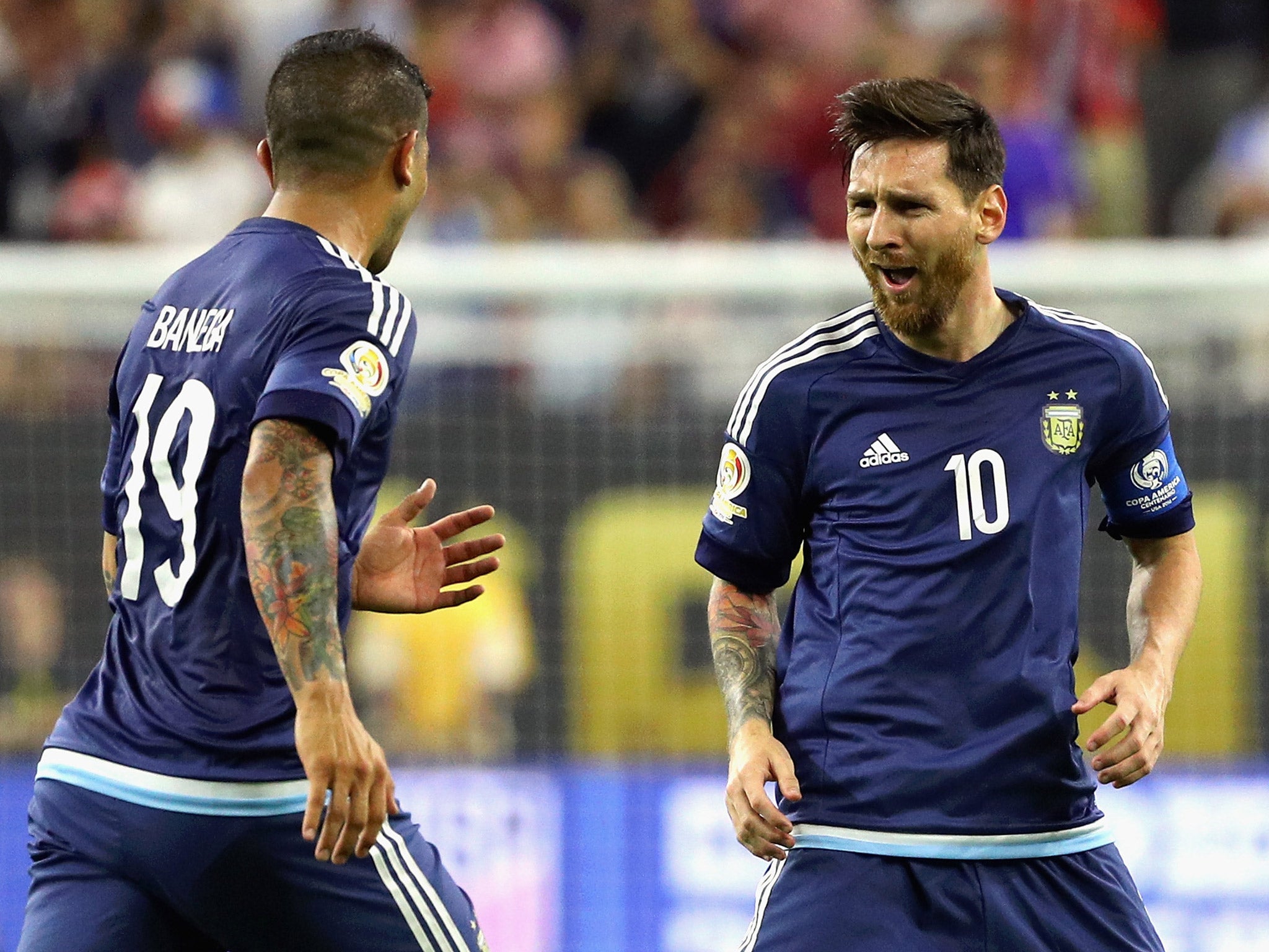 Lionel Messi celebrates after scoring a free-kick for Argentina