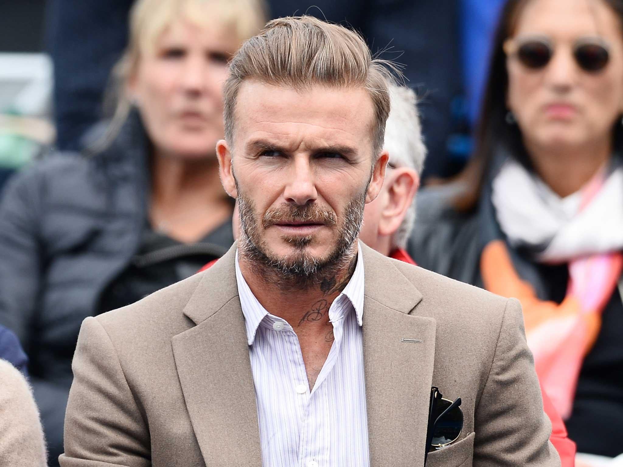 David Beckham is caught in a media firestorm after leaked emails allegedly show he used his charity work as part of a campaign to win a knighthood