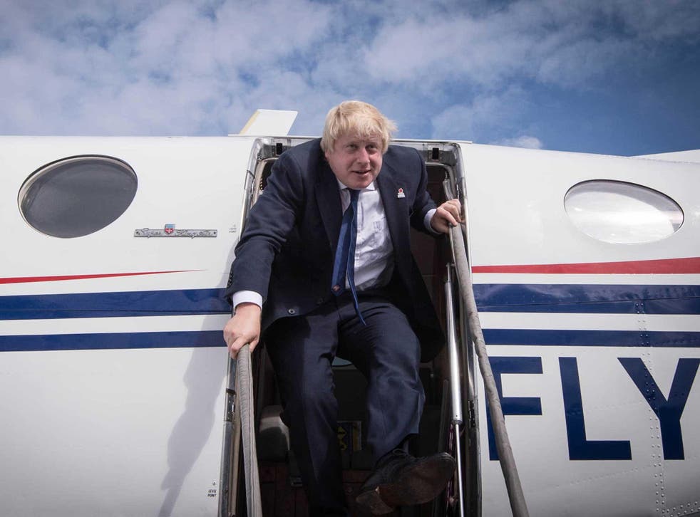 Boris Johnson arrives at East Midlands Airport for a final day of campaigning before the EU referendum, which was held yesterday