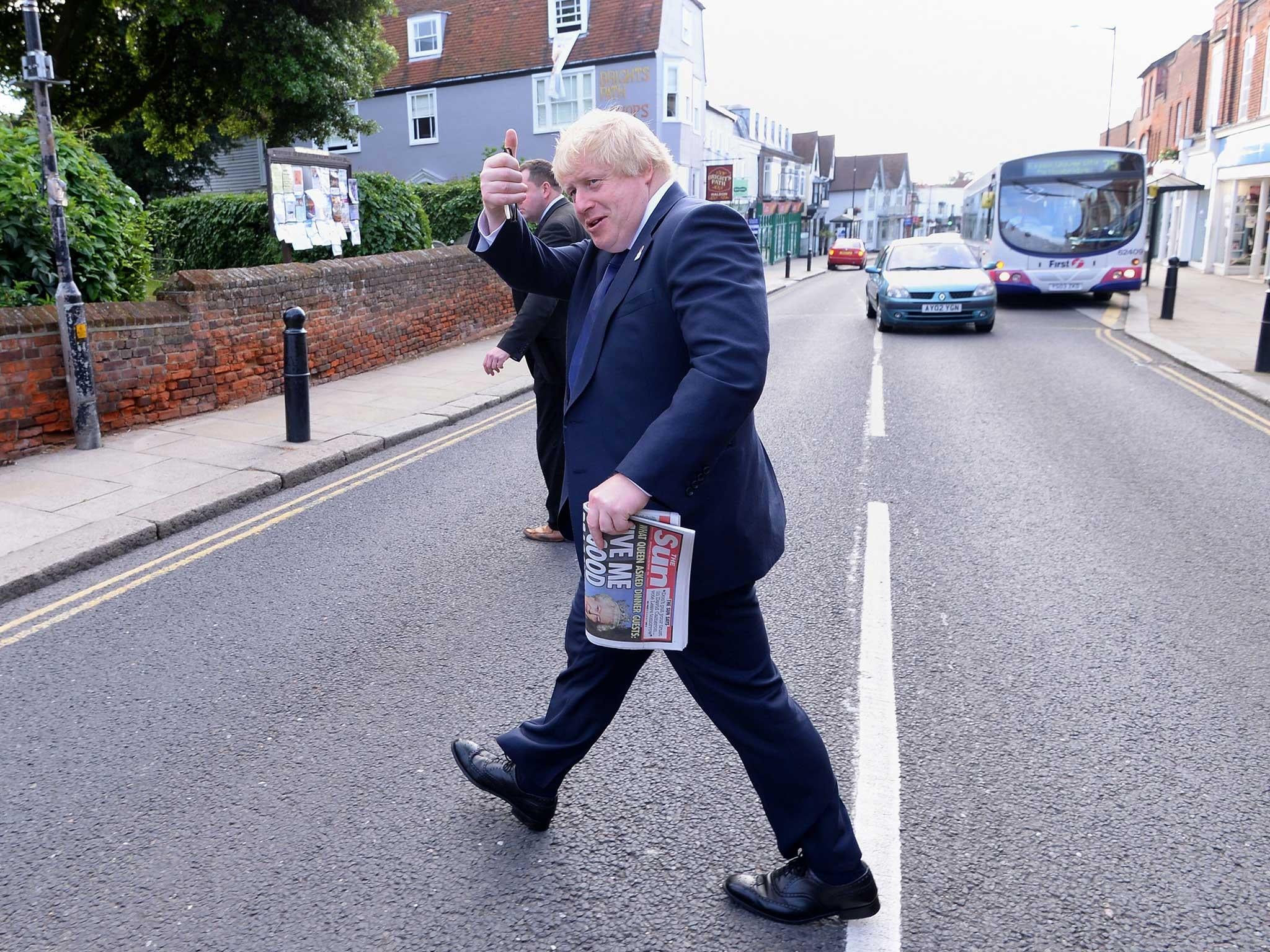 Boris Johnson gives a thumbs up to supporters in Maldon, on the final day of campaigning before the EU Referendum