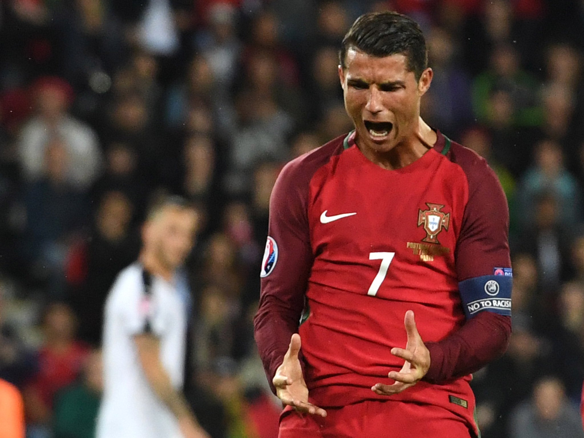 Cristiano Ronaldo reacts after missing a penalty before Portugal against Austria