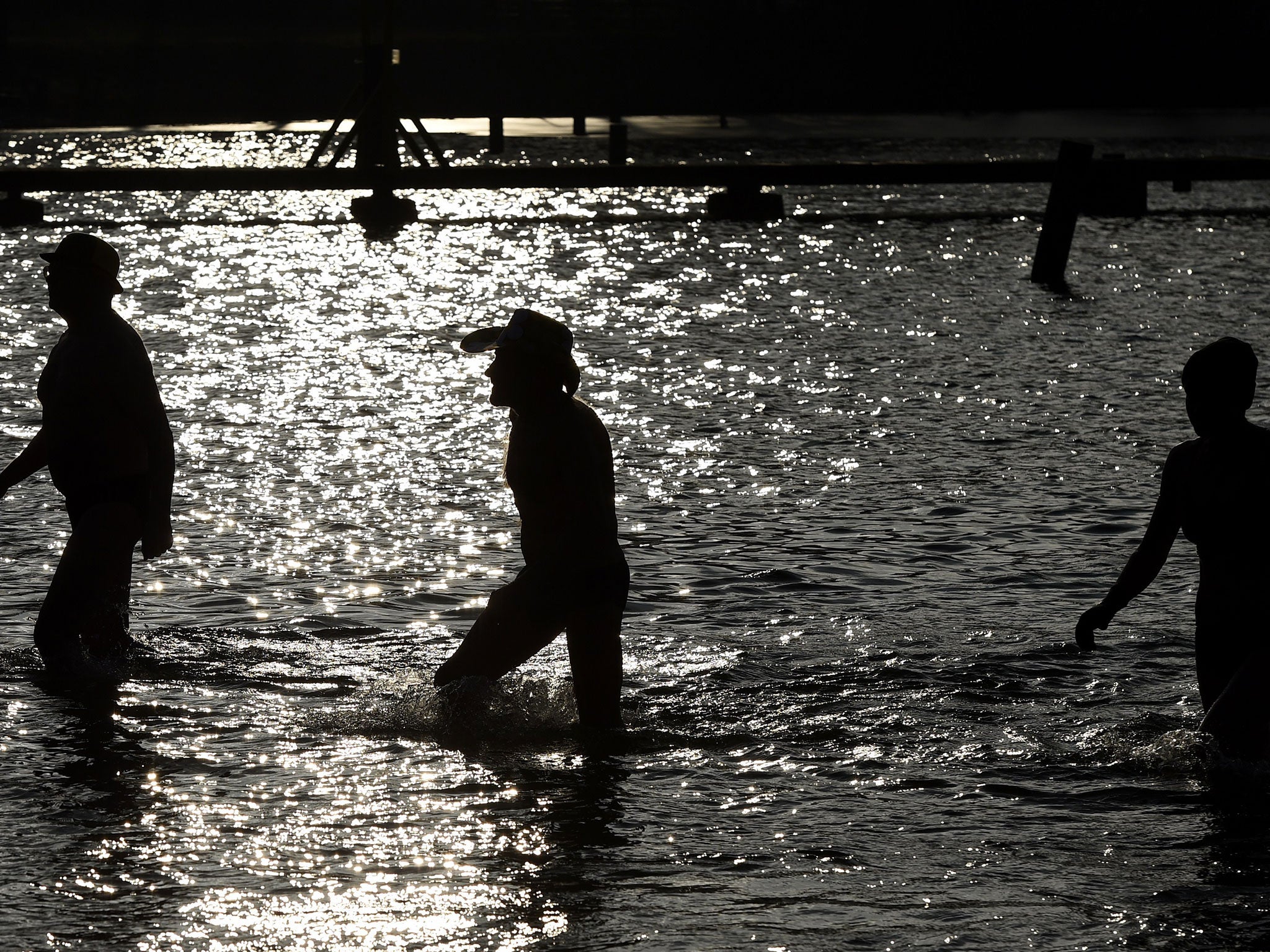 German nudists outraged at new rules ordering them to wear swimwear as refugee shelter arrives on lake The Independent The Independent hq image