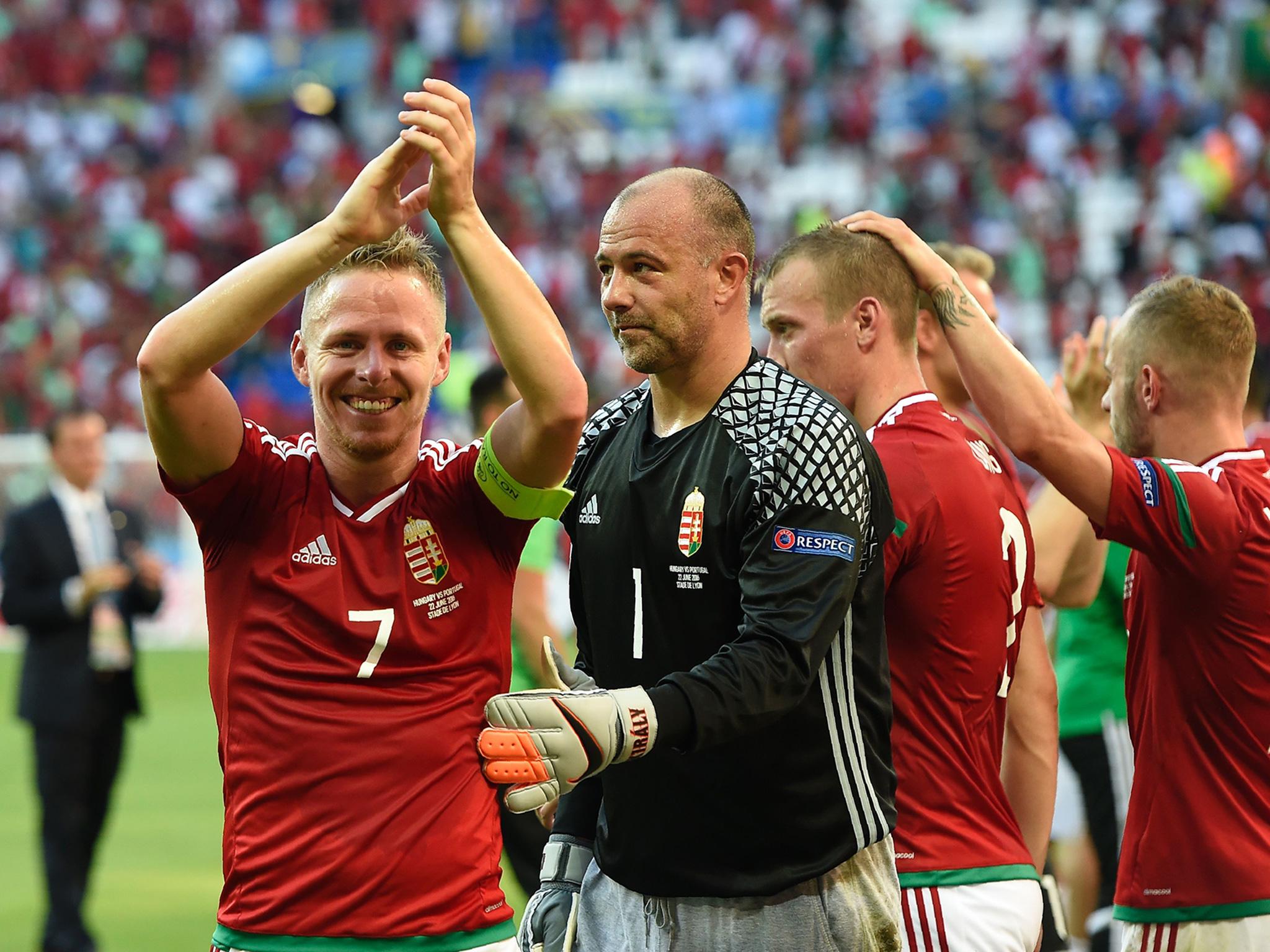 Hungary's players celebrate their qualification as group winners