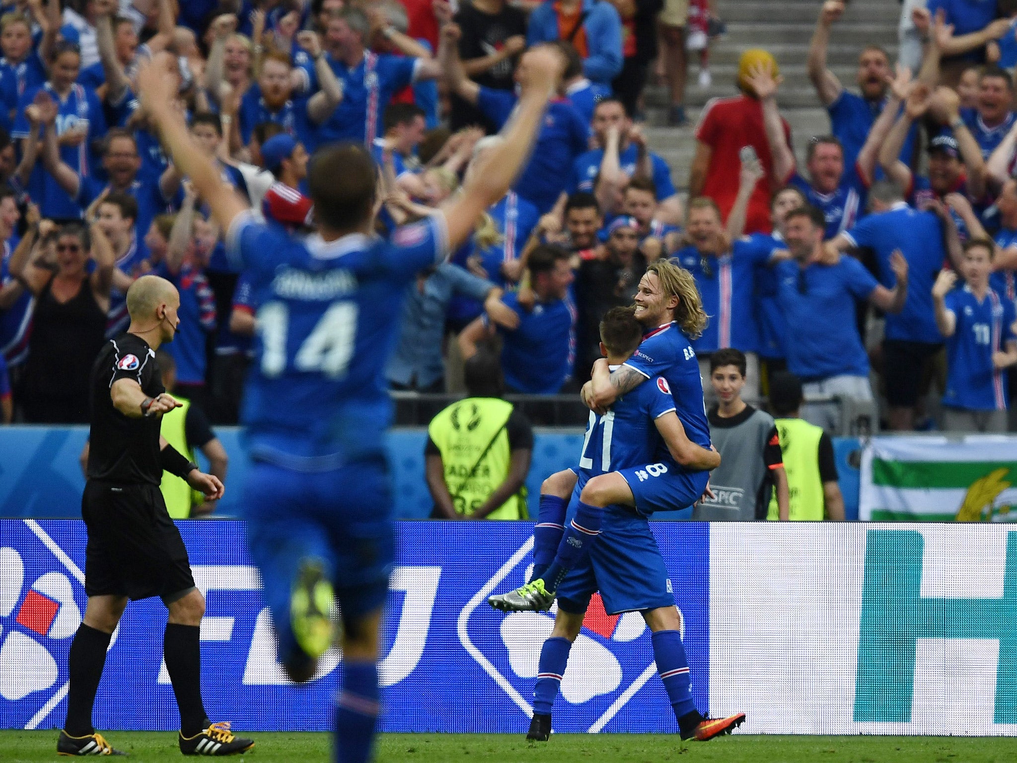 Iceland players and fans celebrate Traustason's goal