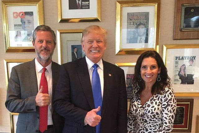 Mr Falwell and his wife posed with Mr Trump after he met with religious leaders