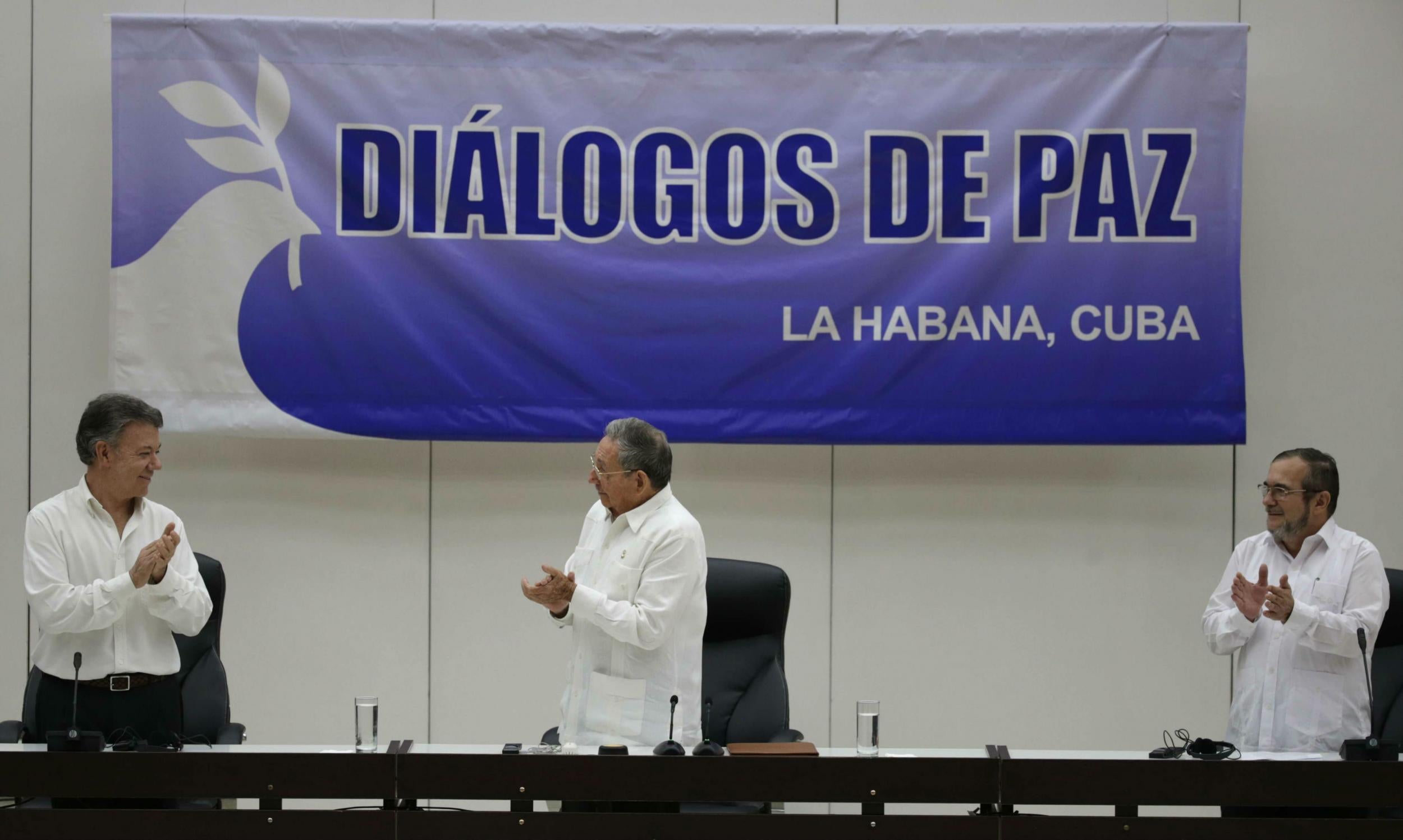 Colombian President Juan Manuel Santos, Cuba's President Raul Castro and Commander of the Revolutionary Armed Forces of Colombia were present for the signing