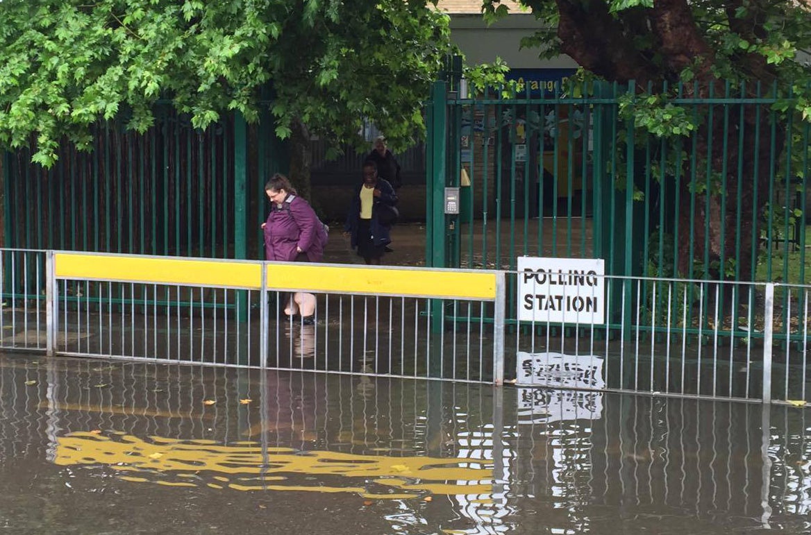 Flooding outside the Grange Primary School in Newham, east London as torrential downpours and flooding have swamped parts of London