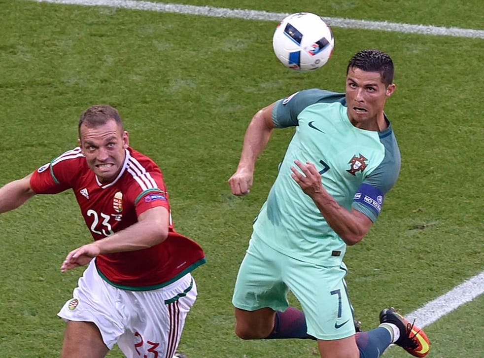 Mind over matter? Portugal's Cristiano Ronaldo heads the ball to score during the Euro 2016 match against Hungary