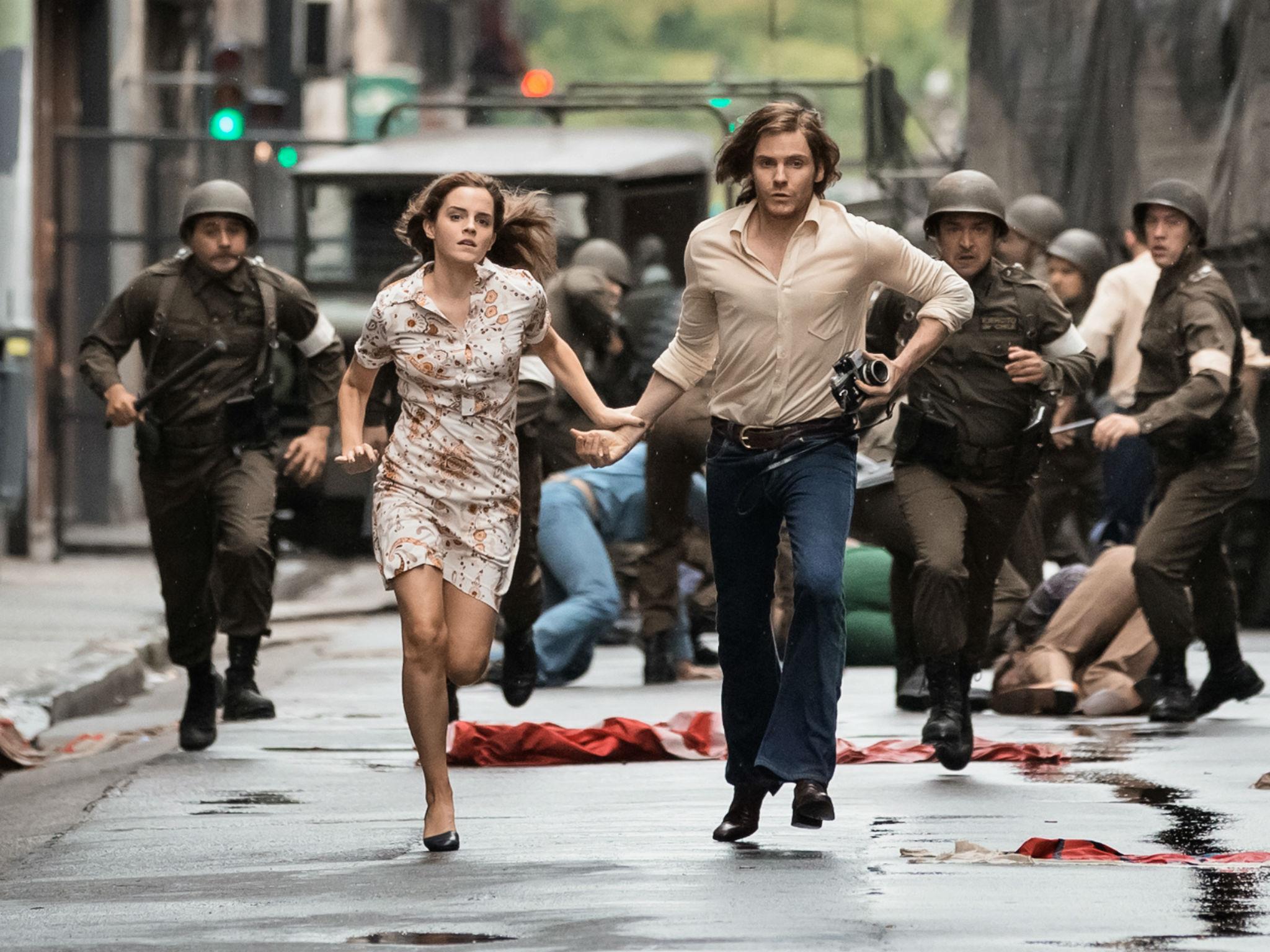 Emma Watson attempts to flee police with Daniel Bruhl in The Colony