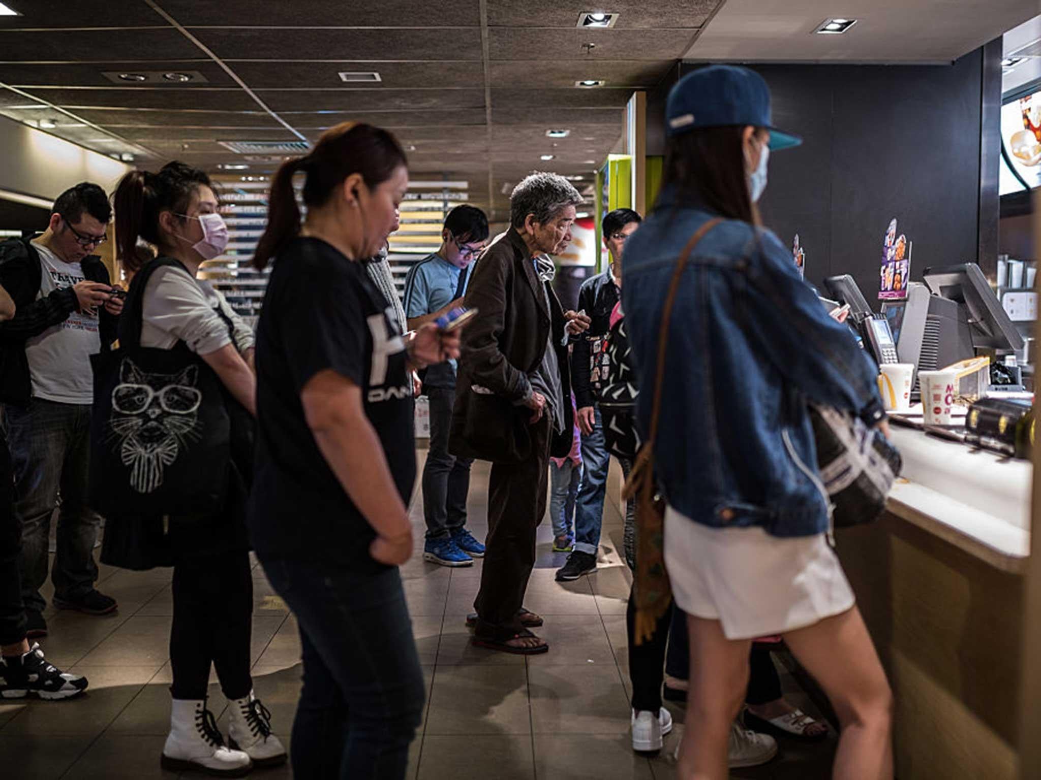 Queues at a McDonald’s outlet in the Kowloon district of Hong Kong