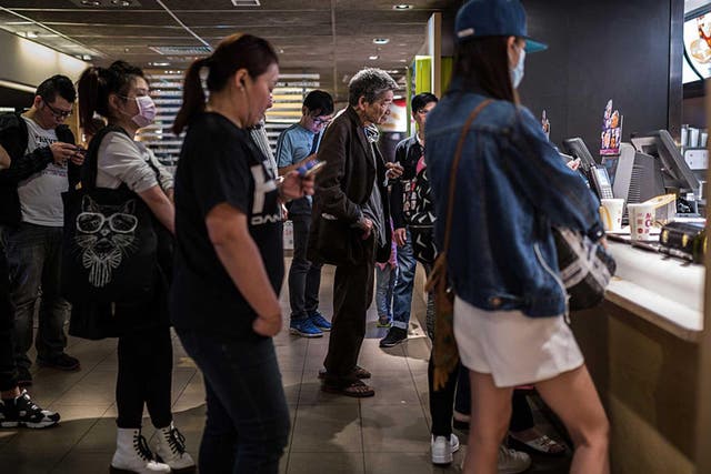 Queues at a McDonald’s outlet in the Kowloon district of Hong Kong