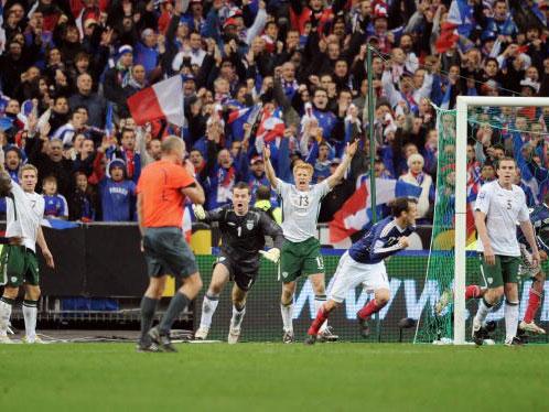 Ireland players protest after Thierry Henry's handball in the 2010 World Cup play-off in France (Getty)