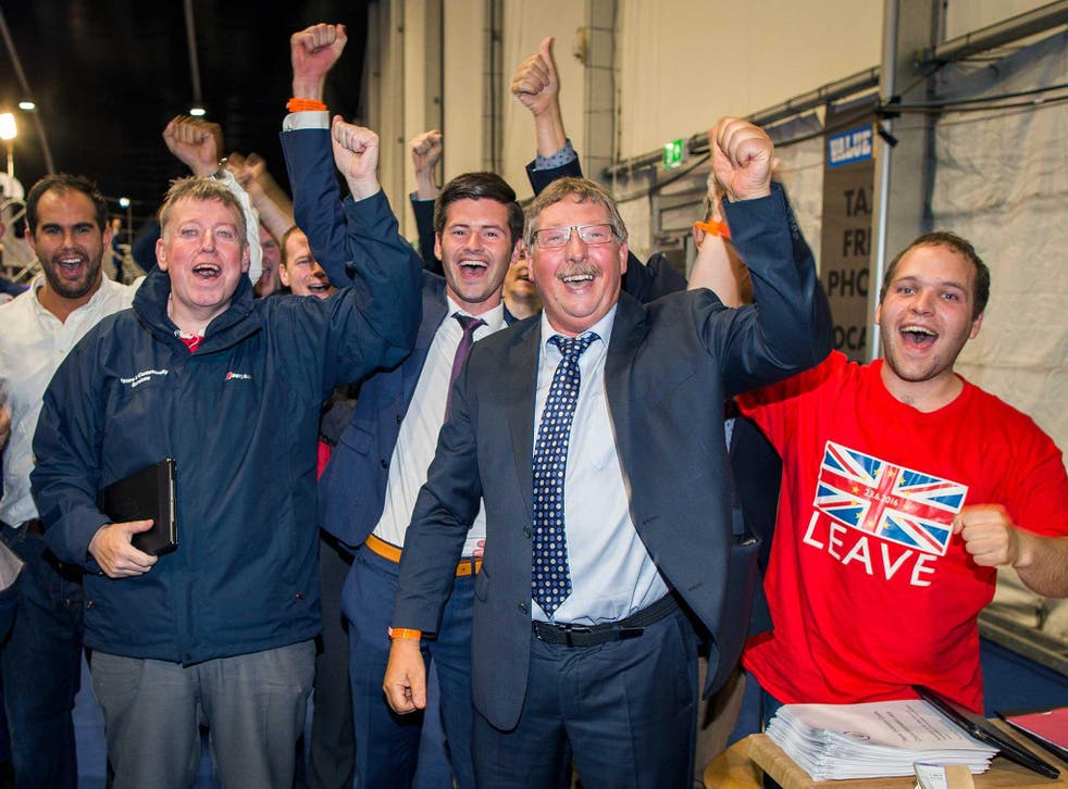 DUP MLA Sammy Wilson (second from right) celebrates with Leave supporters at the Titanic Exhibition Centre, Belfast, after the Leave campaign claimed victory in the EU referendum