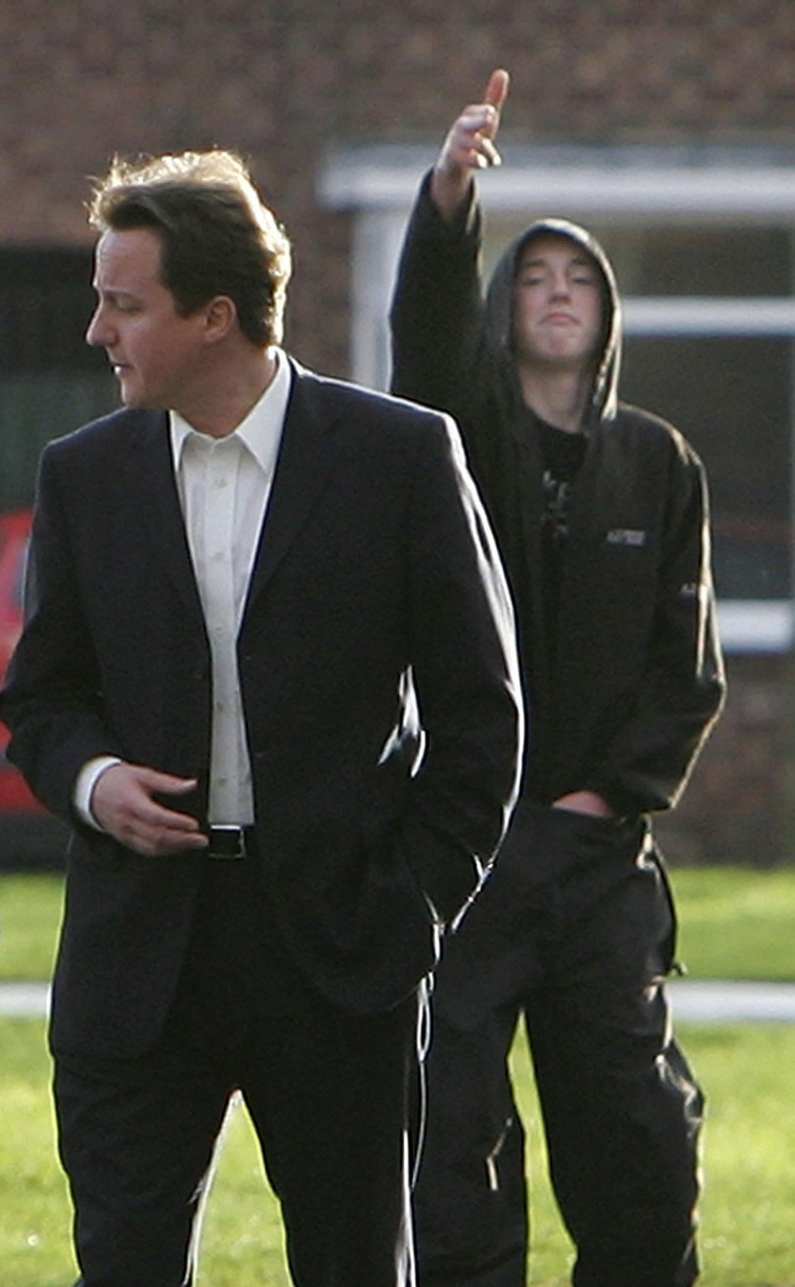 David Cameron is photobombed during a 2007 visit to Benchill estate in Manchester