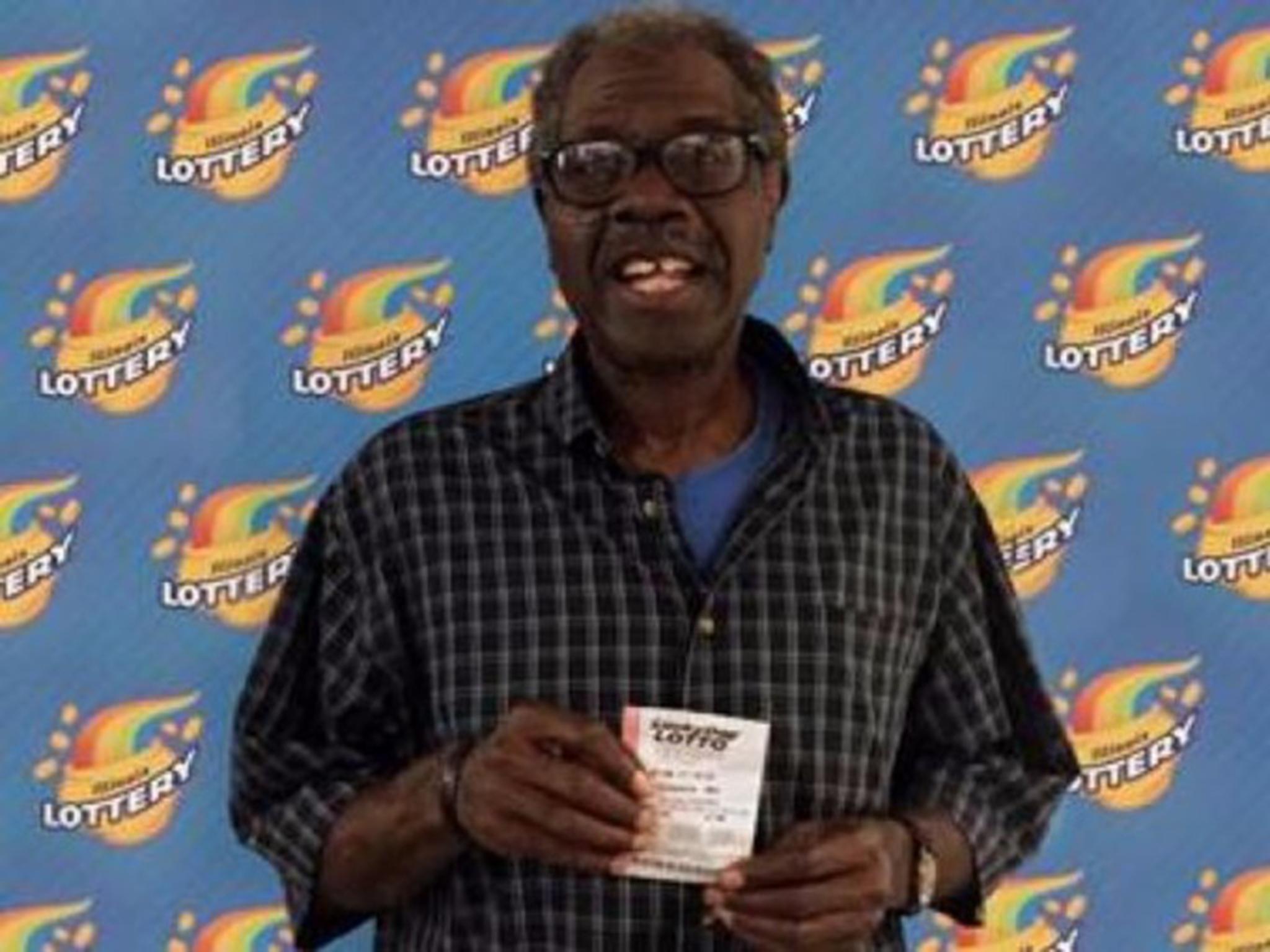 Larry Gambles with his winning ticket