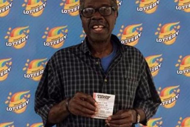 Larry Gambles with his winning ticket
