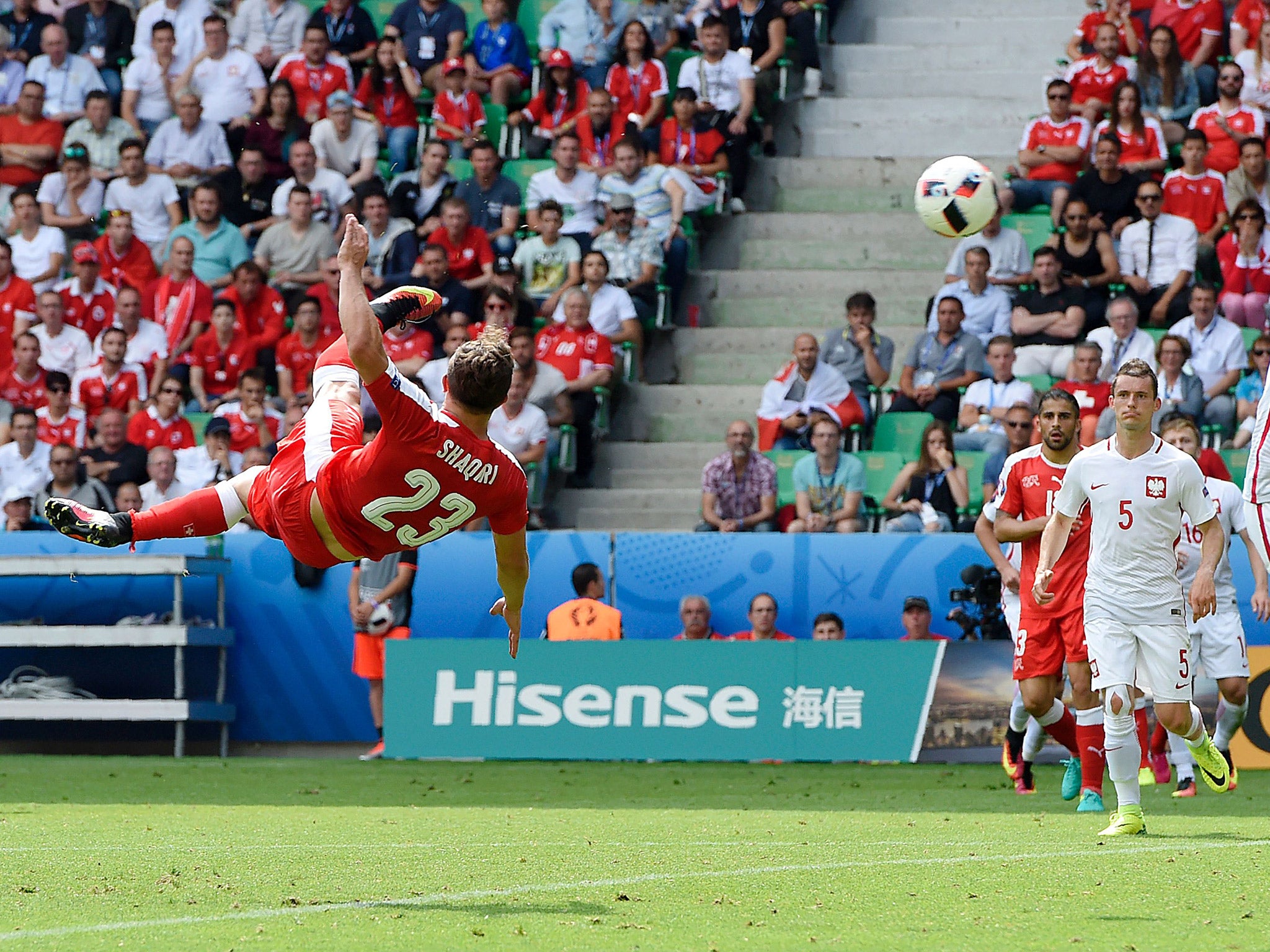 Xherdan Shaqiri hits a bicycle kick to score an equalising goal for Switzerland against Poland