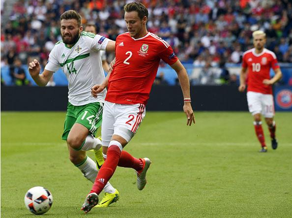 Chris Gunter (right) will miss his brother Marc's wedding due to Wales's success in France