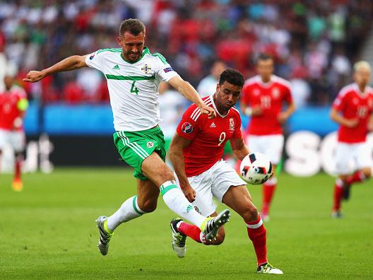 &#13;
McAuley turned the ball into his own net after Bale's cross &#13;