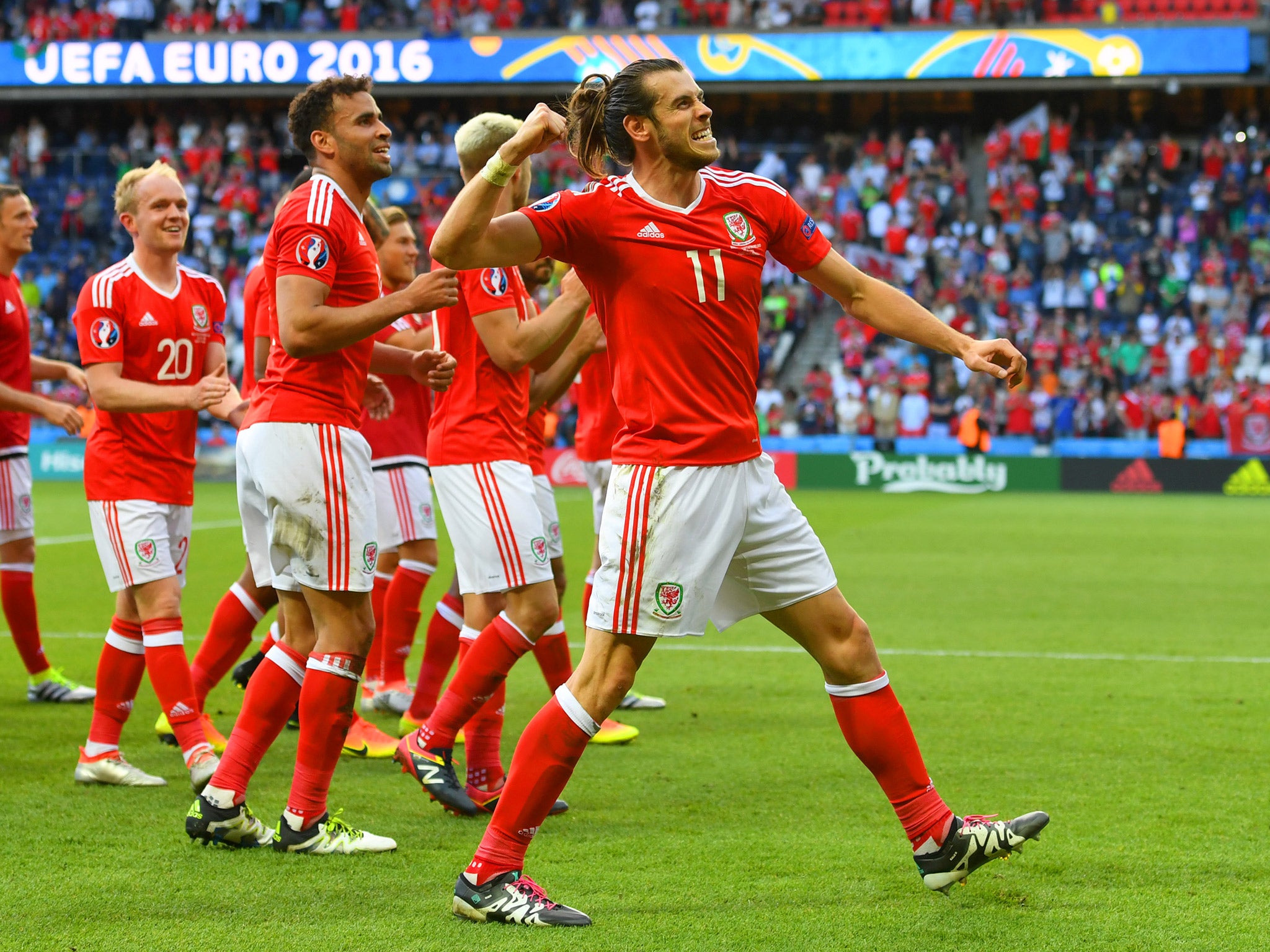 Gareth Bale celebrates Wales's 1-0 victory over Northern Ireland