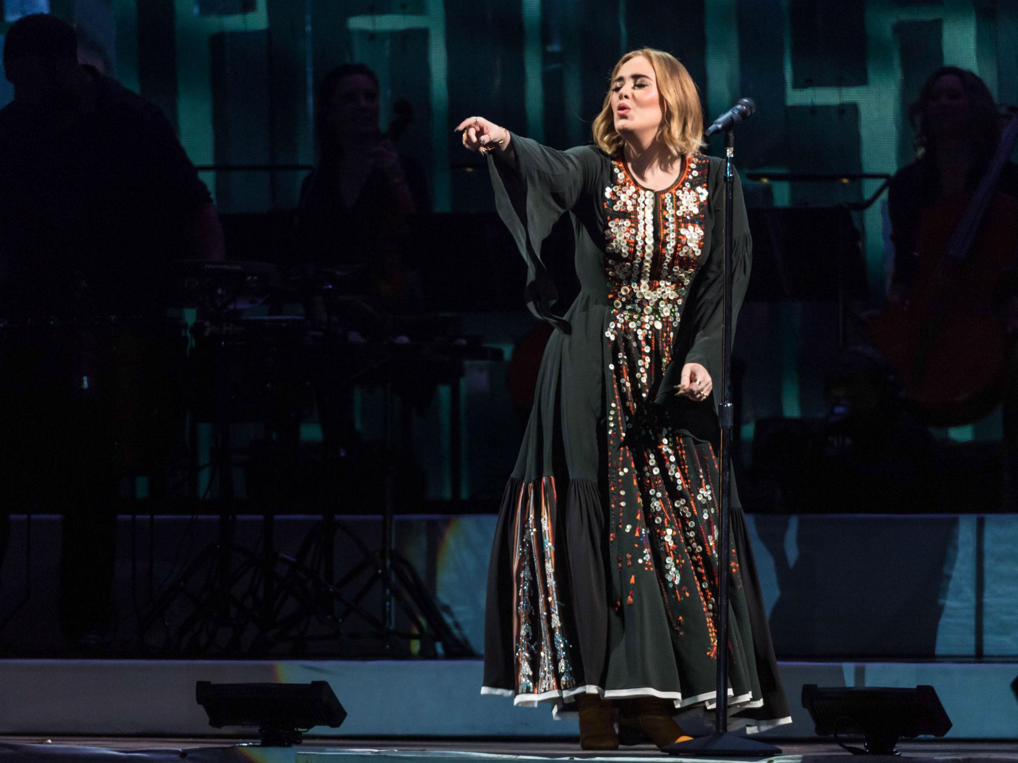 Adele's fans sing her hit songs back at her as she headlines Glastonbury's Pyramid Stage