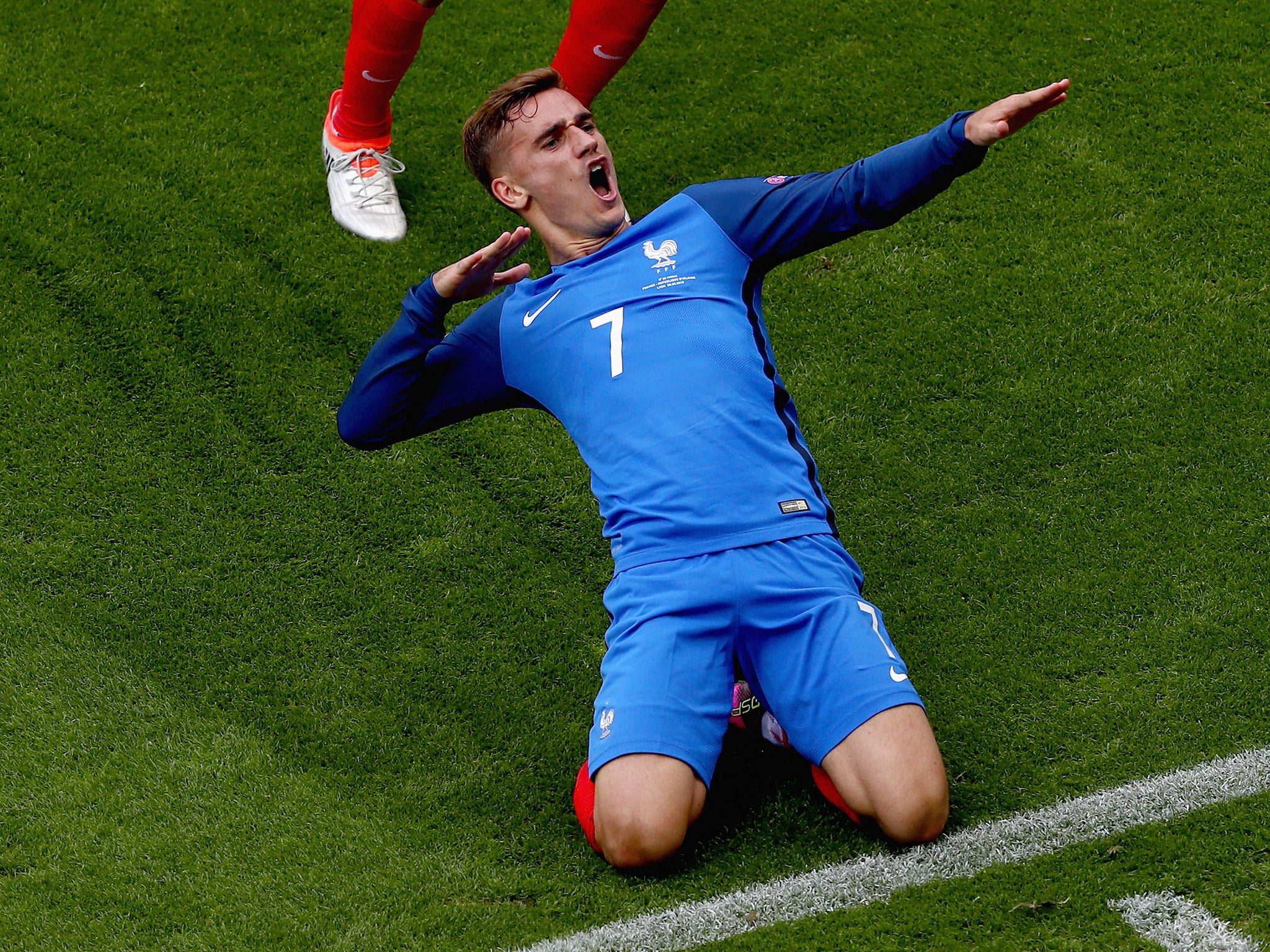 Antoine Griezmann celebrates scoring his first goal for France against the Republic of Ireland