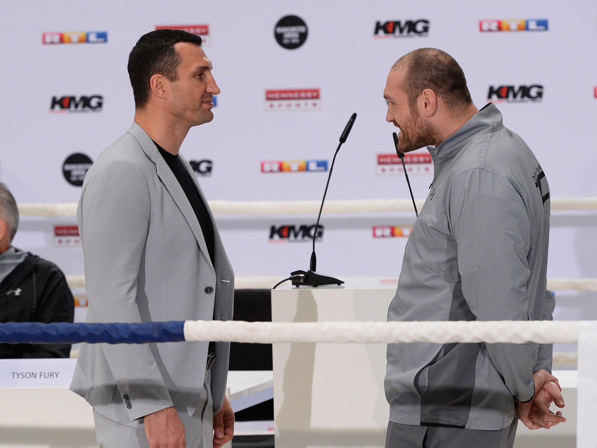 Wladimir Klitschko's (left) and Tyson Fury's (right) rematch has been postponed