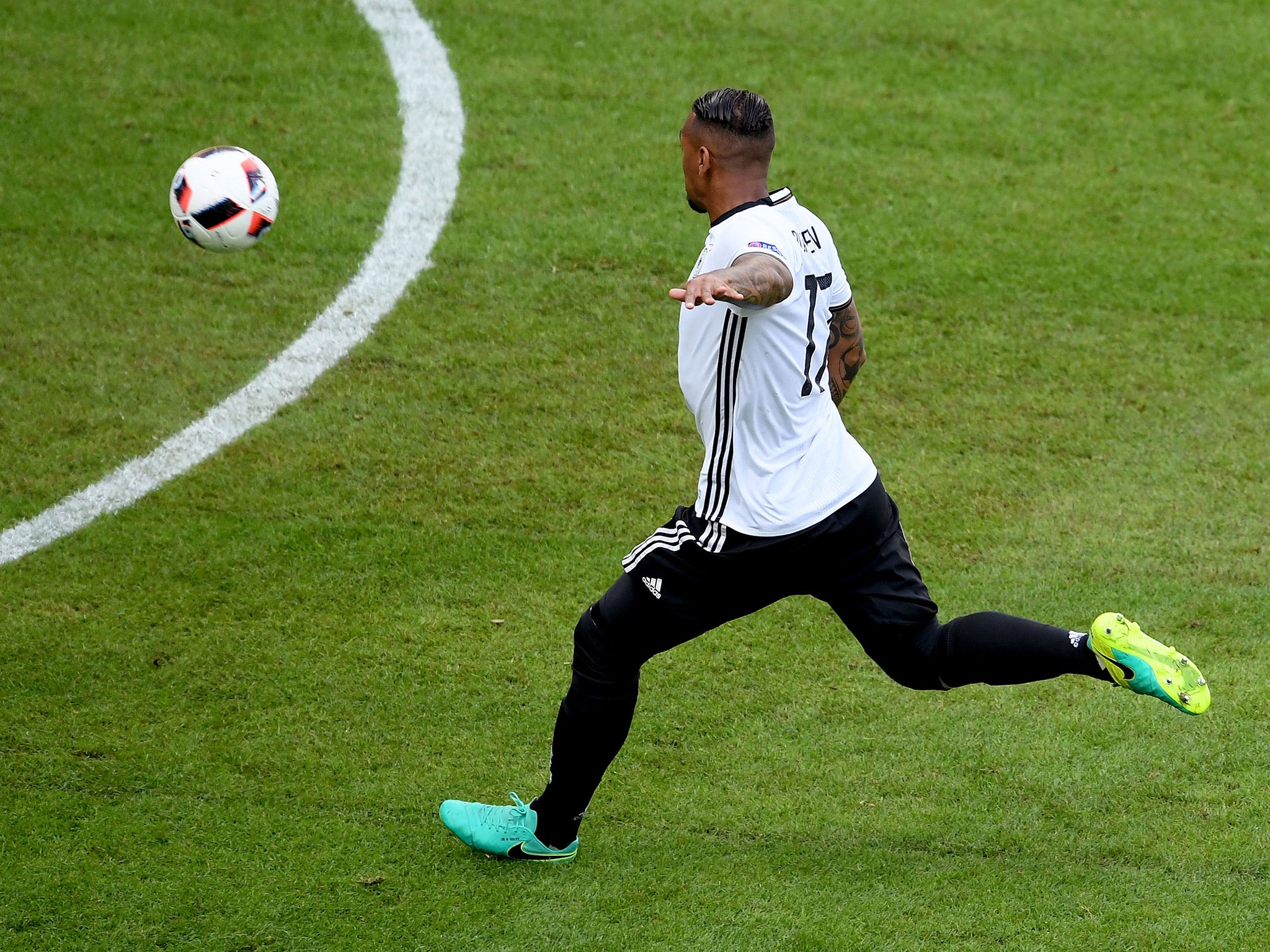 Jerome Boateng hits a volley that gives Germany the lead against Slovakia