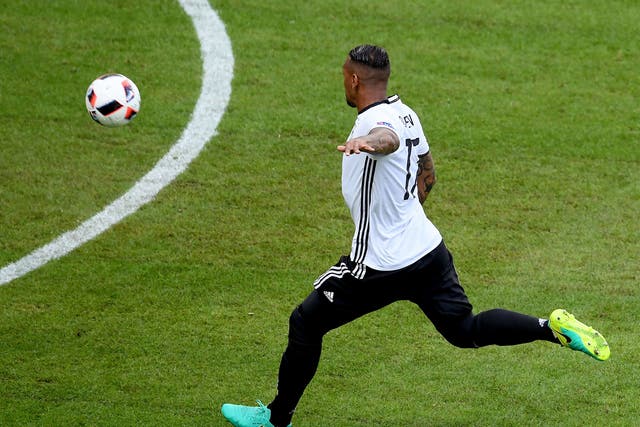 Jerome Boateng hits a volley that gives Germany the lead against Slovakia