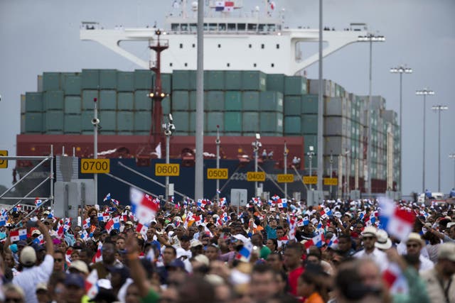 Thousands watch at the vest mega-vessel noses in on Sunday