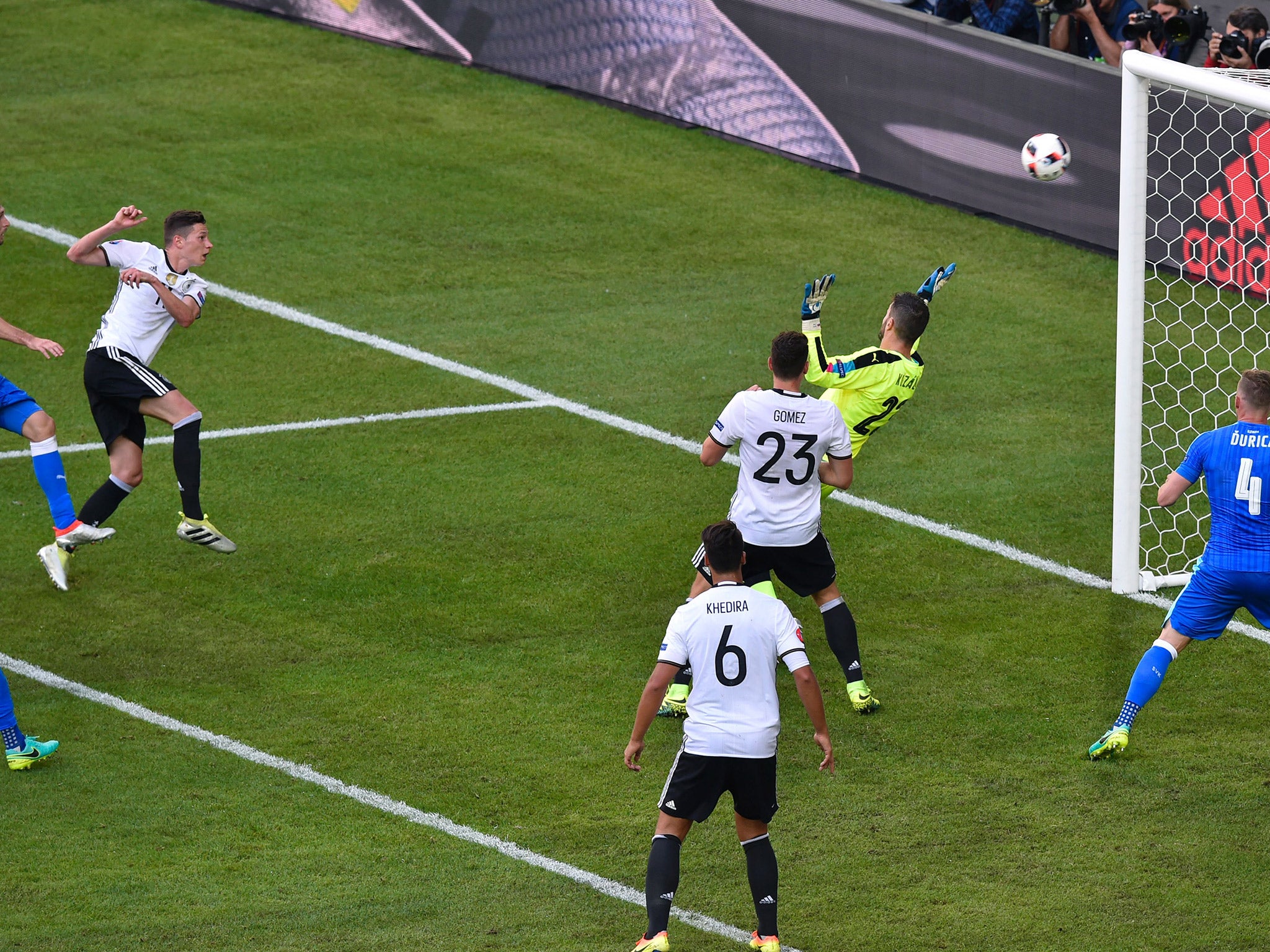 Julian Draxler volleys home Germany's third goal against Slovakia
